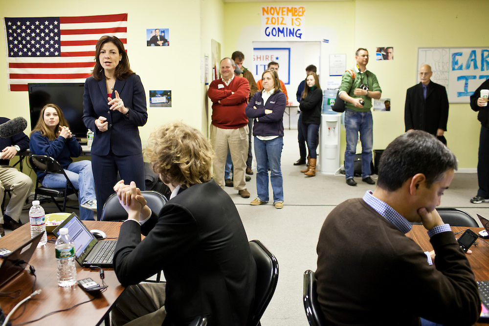 Sen. Kelly Ayotte (R-NH), left, speaks to volunteers and staff at the New Hampshire campaign headquarters of Republican presidential candidate Mitt Romney on Monday, January 9, 2012 in Manchester, NH. Brendan Hoffman for the New York Times